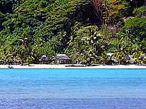 Samoa/Upolu: Typical beach with 'Fales' on the island of Namua in the East of Upolu